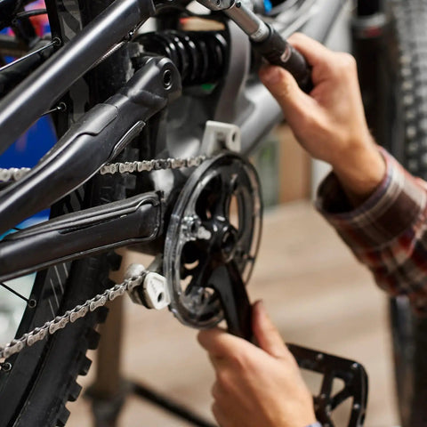Close-up of bike gears being adjusted with Clip On Bike Handlebar Stand Stabilizer 2 Pack Portable Repair Bracket.