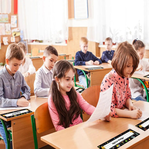 Children in a classroom using 60 Piece Science Desk Name Plates For Classroom And Lab Use, Multipurpose Student Name Tags