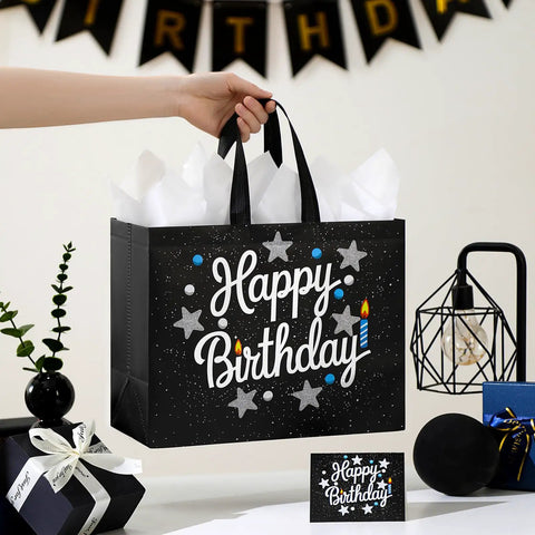 2 Pack 13 Inch Large Birthday Gift Bags With Tissue Paper And Cards, Reusable Nonwoven Gift Bags With Handles on table