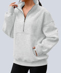 Women wearing a Women's Quarter Zip Oversized Fleece Pullover Hoodie Sweatshirt Mock Neck Sweater For Fall, Cozy AF Soft Cotton-Poly Blend