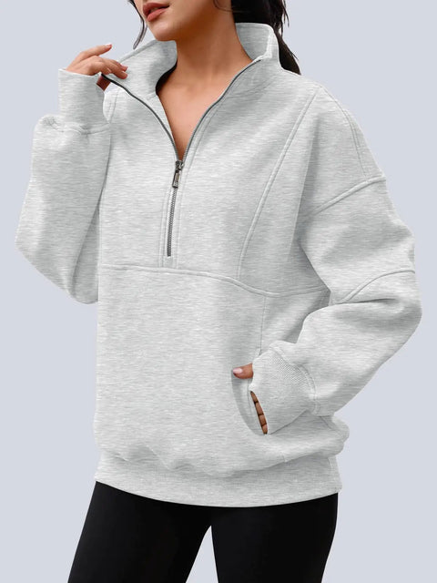 Women wearing a Women's Quarter Zip Oversized Fleece Pullover Hoodie Sweatshirt Mock Neck Sweater For Fall, Cozy AF Soft Cotton-Poly Blend