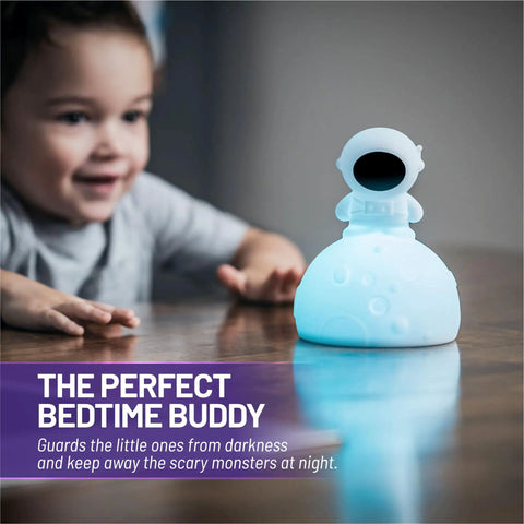 Child reaching for Animal Night Light For Kids With Rechargeable Silicone And ABS Nursery Glow In 8 Calming Colors Soft Non Toxic Lamp