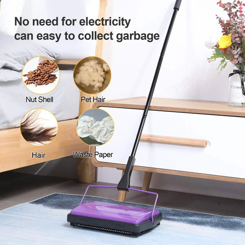 Lightweight Manual Carpet Sweeper And Rug Cleaner Cruises Across Carpets Without Breakin A Sweat Picks Up Pet Hair And Dust Like A Charm For Quick Daily Cleanup Sessions on a rug gathering debris.