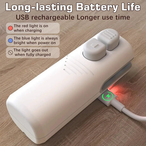 White Three In One Bag Sealer with Cutter and Bottle Opener, USB rechargeable, shown charging on a wooden surface