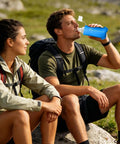 Man drinking from a Foldable Soft Water Bottle That Is Leakproof And Packable For Travel Hikes And Camping Ultra Flexible Pouch Design