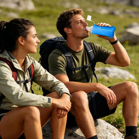 Man drinking from a Foldable Soft Water Bottle That Is Leakproof And Packable For Travel Hikes And Camping Ultra Flexible Pouch Design