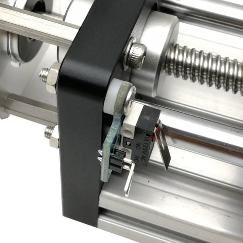 Close-up of CNC 3018 Update Kit with Sliding Table and Motor 52mm Spindle Fixture showing X Axis SCS10UU Slider and Limit Switch