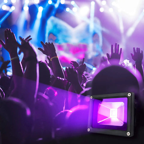 Two Pack 10W UV Black Light Flood Lamps with Plug Waterproof IP65 illuminating a vibrant nightclub scene
