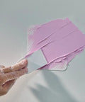 Application of DryDex Spackling Wall Repair Patch Kit With Pink To White Dry Time Indicator 8 Oz on wall surface.