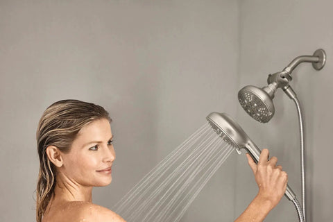 Woman using High Pressure Dual Shower Head With Handheld Spray 3 Way Diverter Spot Resist Brushed Nickel Finish Cranks Up The Water Power