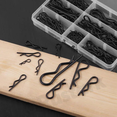 Six Sizes Black Zinc Plated Hitch Pins R Clips Kit with 145 pcs, visible in a clear organized storage box, on a wooden surface.