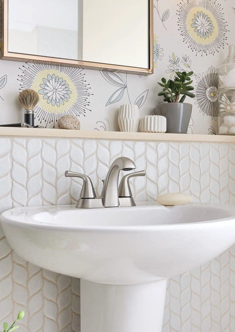 Spot Resistant Brushed Nickel Two-Handle 4-Inch Centerset Bathroom Faucet with Fingerprint-Free Finish on White Sink