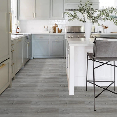 Modern kitchen with Self Adhesive Peel And Stick Floor Tile Set 10 Pack 15 Sq Ft Natural Grey Wood Grain Look Waterproof PVC Vinyl Plank Flooring.