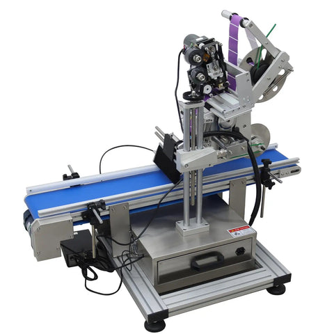 Plug And Go Automatic Flat Bottle Label Applicator Desktop Labeling Machine With Conveyor Belt And Print Coder For Boss Level Accuracy Flat Surface Wrapping showing stainless body and blue conveyor.