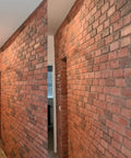 Interior wall featuring Antique Brick Concrete Mold Kit BS 6113 Flat Molds for DIYers with realistic old brick texture.