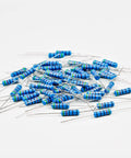 Pro Grade 2W Metal Film Resistor Assorted Kit, 250 Pieces, scattered resistors with color bands on a white background