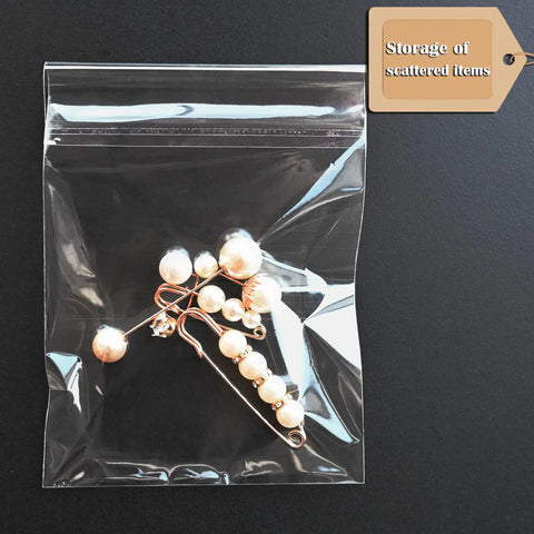 Self Sealing Cellophane Bags For 8.5x11 Photo Mats, Clear Reclosable Sleeves, 100 Pack with jewelry inside for storage