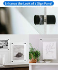 Top Tier Eight Pack Standoff Mounts Three Quarter By One Inch Brushed Stainless Steel Wall Brackets holding sign panels and pictures.
