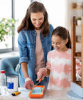 Woman and child using 2 Inch Small Fine Finish Paint Roller Kit With Tray For Tight Corners And Trim, painting furniture
