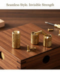 Gold Zinc Alloy Concealed Barrel Hinge For Jewelry Boxes And Cabinets, Invisible Pivot Hardware displayed on wood surface.