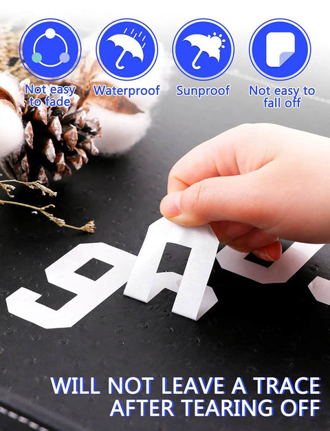 Hand peeling Reflective Mailbox Numbers And Letters Stickers Decals, 148-Piece Vinyl Self-Adhesive Address Kit from surface.