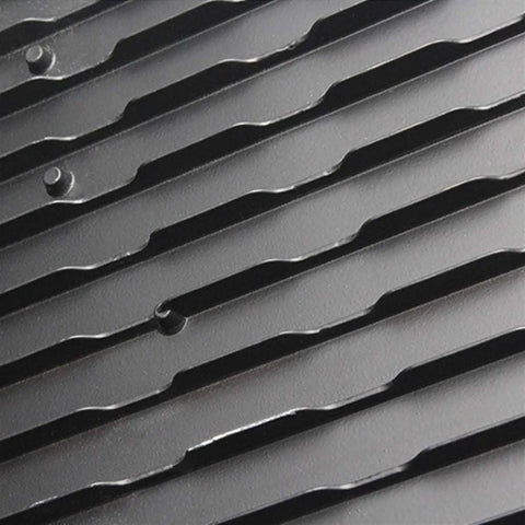 Close-up of the textured surface of the JUDYSSY Led Flood Light Emergency Portable Searchlight Mobile Portable Chargin housing.