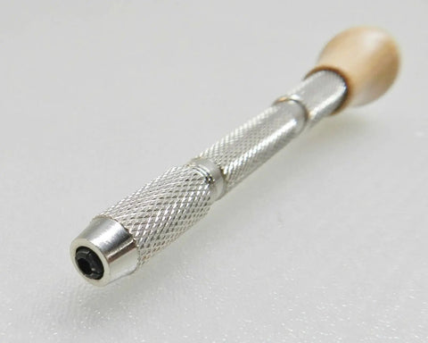 Rock Solid Wire Rounder Pin Vise With Swivel Head Wooden Handle And Kickass Collet Chuck Kit Featuring Slick Precision Burs for jewelry making, angled view.