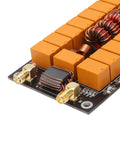 Close-up of ATU-100 Mini Automatic Antenna Tuner Kit for Ham Radio Nerds with OLED Display DIY Tuner Board, connectors, and coils.