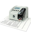 Plug And Play Digital Timestamp Maker That Prints One Or Two Lines On The Fly And Adjusts Four Custom Data Sets For Fast Payroll Processing Or Quick Document Tracking In Cool Gray on a document.