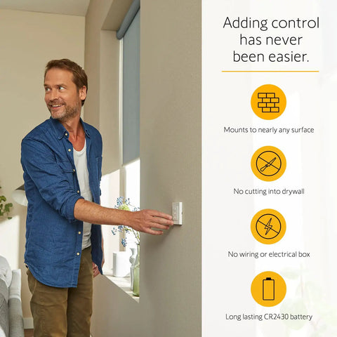 Man using 4 Channel Wall Mount Remote Controller For Motorized Shades, Curtains, And Blinds, Wireless, Easy Install, Seamless Control