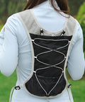 Back view of Reflective 5L Hydration Vest for Running and Cycling, showing black breathable mesh with adjustable straps and pockets.
