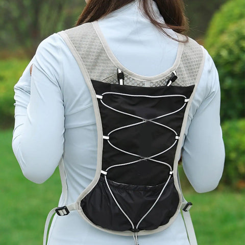 Back view of Reflective 5L Hydration Vest for Running and Cycling, showing black breathable mesh with adjustable straps and pockets.