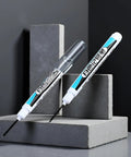 Top Shelf White Permanent Markers Quick Dry Oil Based Ink For Metal Glass Wood Built Tough Industrial And Craft Projects Smooth Writing Long Nozzle Nailed Every Job on gray concrete blocks.