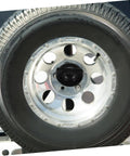 Close-up of spare tire with bolt clip, Spare Tire Bolt Retainer Clamp For Cars And Trucks, Easy Install Hold Down.