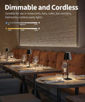 Cordless Table Lamp Portable LED Desk Light with 5000mAh Battery 3 Color Stepless Dimming on cafe table setting.