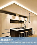 65.6ft Warm White LED Strip Lights Kit With Dimmable 24V Power Supply illuminating modern kitchen ceiling
