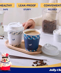Two Color Leaf Design 10 Oz Disposable Coffee Cups With Lids Sleeves And Stirrers 100 Pack Value Set For Home Office Cafe Blue Leaf And Grey Leaf Prints Includes White Lids And Accessories shown on a wooden tray