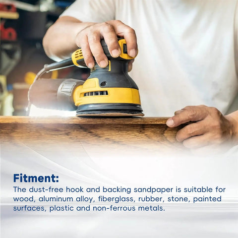 Person using a power sander with 100 Pc Hook Loop Sanding Discs With Aluminum Oxide Grit for smooth quick changes on surfaces.