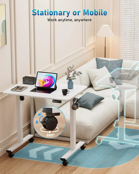 32 Inch Electric Rolling Standing Desk With Adjustable Height, Mobile Sit Stand Desk On Lockable Casters, 31.5 By 23.6 Inch Surface, White Frame And White Top, Space Saving Ergonomic Workstation For Home Office And Computer Setup displayed in living room setup with electronics and decor.