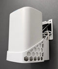 Wall Mount Bracket For Xfinity Comcast Xb8 Router Wifi mounted on wall, featuring honeycomb design and concealed cables.