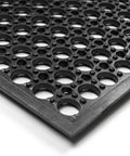 Close-up of Heavy Duty Rubber Door Mat 36 By 24 Inches with drainage holes and grippy texture for wet areas.