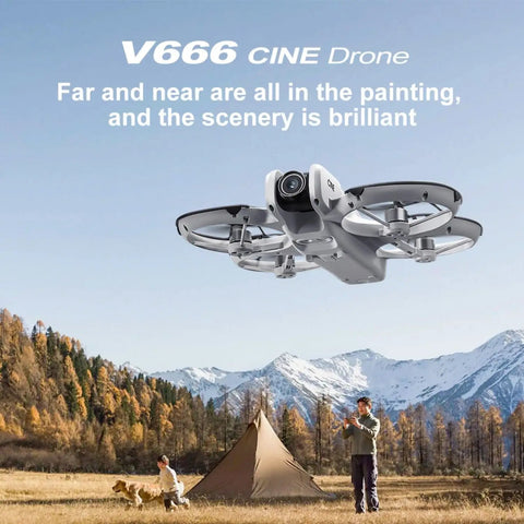 Phone Free FPV RC Drone With Built In Display Screen Remote Controller flying over a campsite with mountains in the background