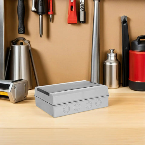 Solid Outdoor Waterproof Electrical Enclosure Box With Reinforced Ps Structure And Breaker Panel Cover on a workbench with tools.