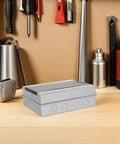Heavy Duty Weatherproof Outdoor Electrical Box With Reinforced Breaker Panel Cover on a workbench surrounded by tools.