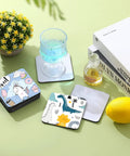 100 Piece Sublimation Blank Cup Coaster Set Bulk Neoprene Mats For Sublimation Transfer Heat Press Printing DIY Crafts 3.93 Inch Square Non Slip Bottom Durable on display with colorful designs