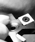 Square Carbide Inserts For Surfacing Router Bits, 10mm X 10mm, shown on a cutter head with 4 indexable edges