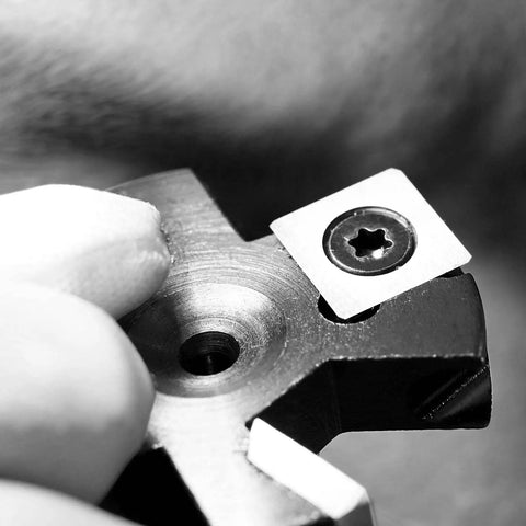 Square Carbide Inserts For Surfacing Router Bits, 10mm X 10mm, shown on a cutter head with 4 indexable edges