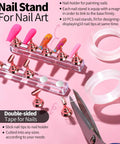All-In-One Nail Art Kit With 15 Brushes, 5 Dotting Tools, Magnetic Nail Stands, Nail Holder And Palette showing nail tips on stands