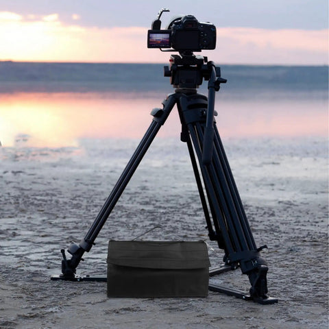 Beefy Heavy Duty Photography Sandbag Weight Bag With Oxford Cloth beside tripod at beach sunset