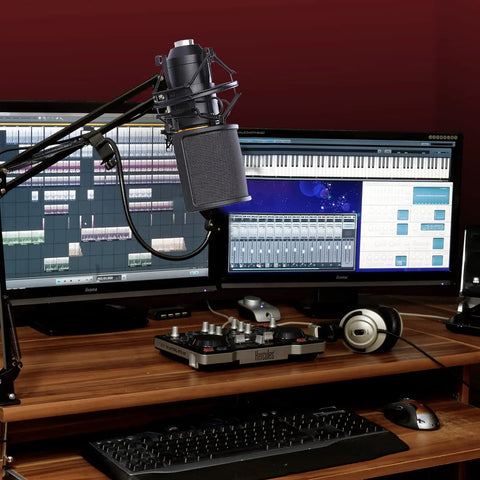 Mic Shock Mount With Pop Filter For 46mm To 51mm Condenser Microphones in music studio setup, reduces noise for crisp sound.